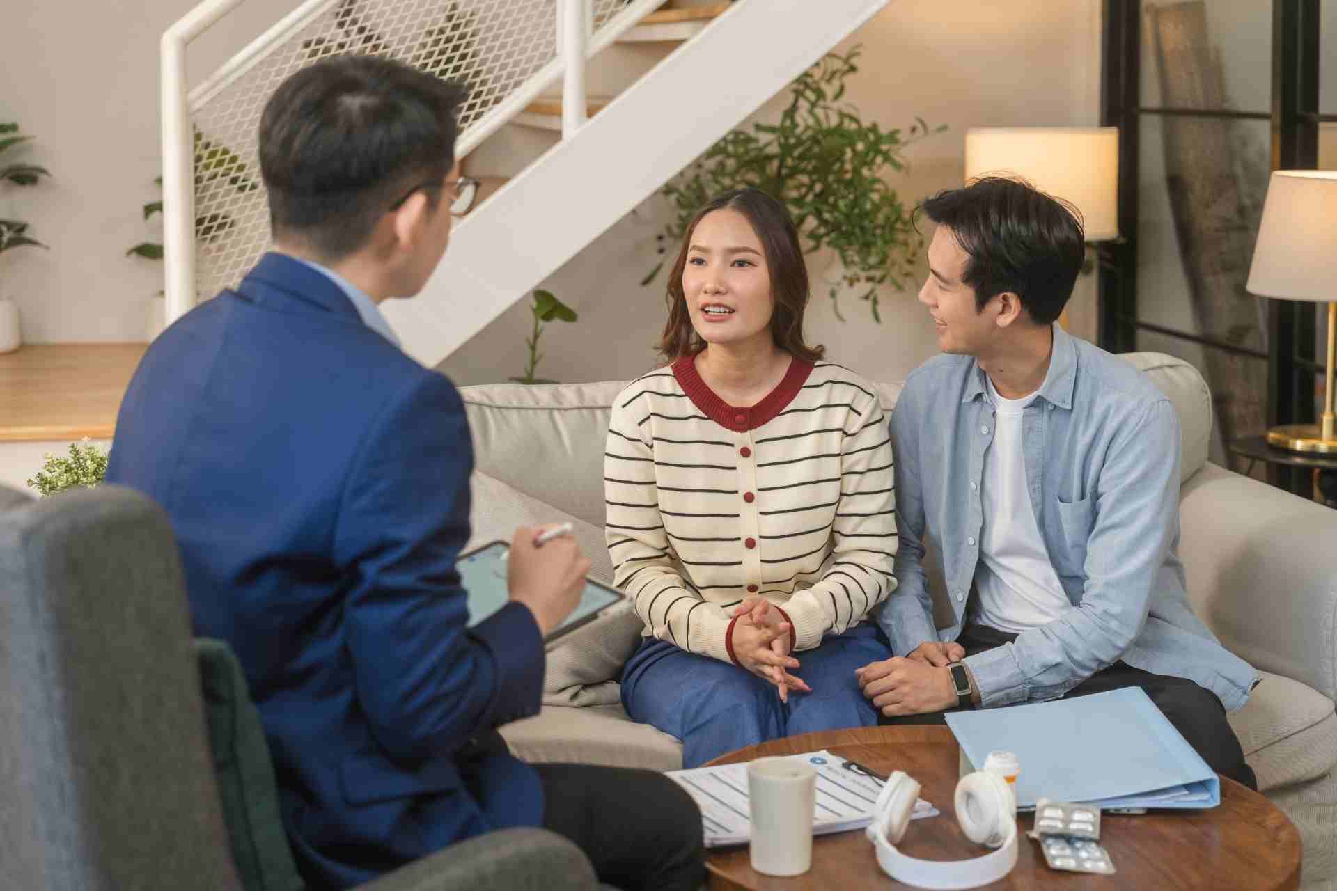 A therapist leads a Dialectical Behavior Therapy (DBT) session with a couple, helping them strengthen communication, emotional regulation, and healthy relationship skills.