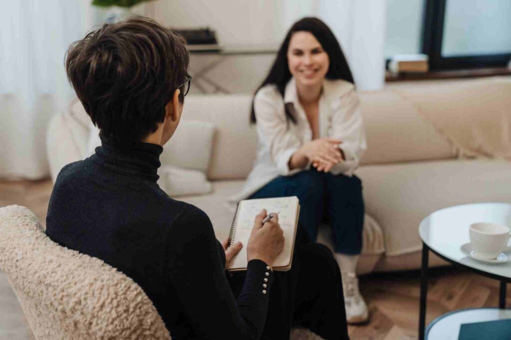 Therapist conducting an EMDR therapy session with a client for trauma recovery.