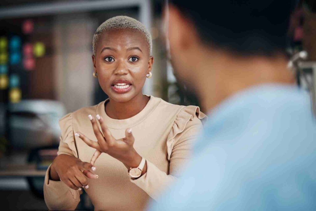 Employee discussing depression-related leave and workplace accommodations with another person