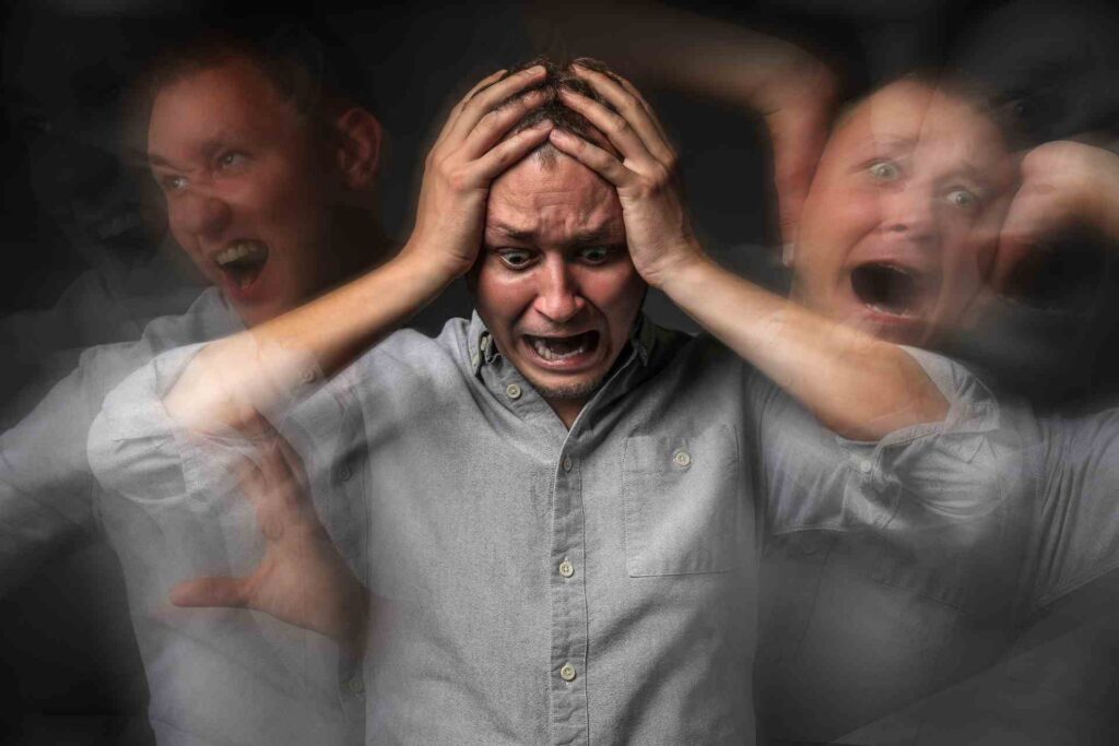 Person experiencing chest tightness and shortness of breath during a panic attack.