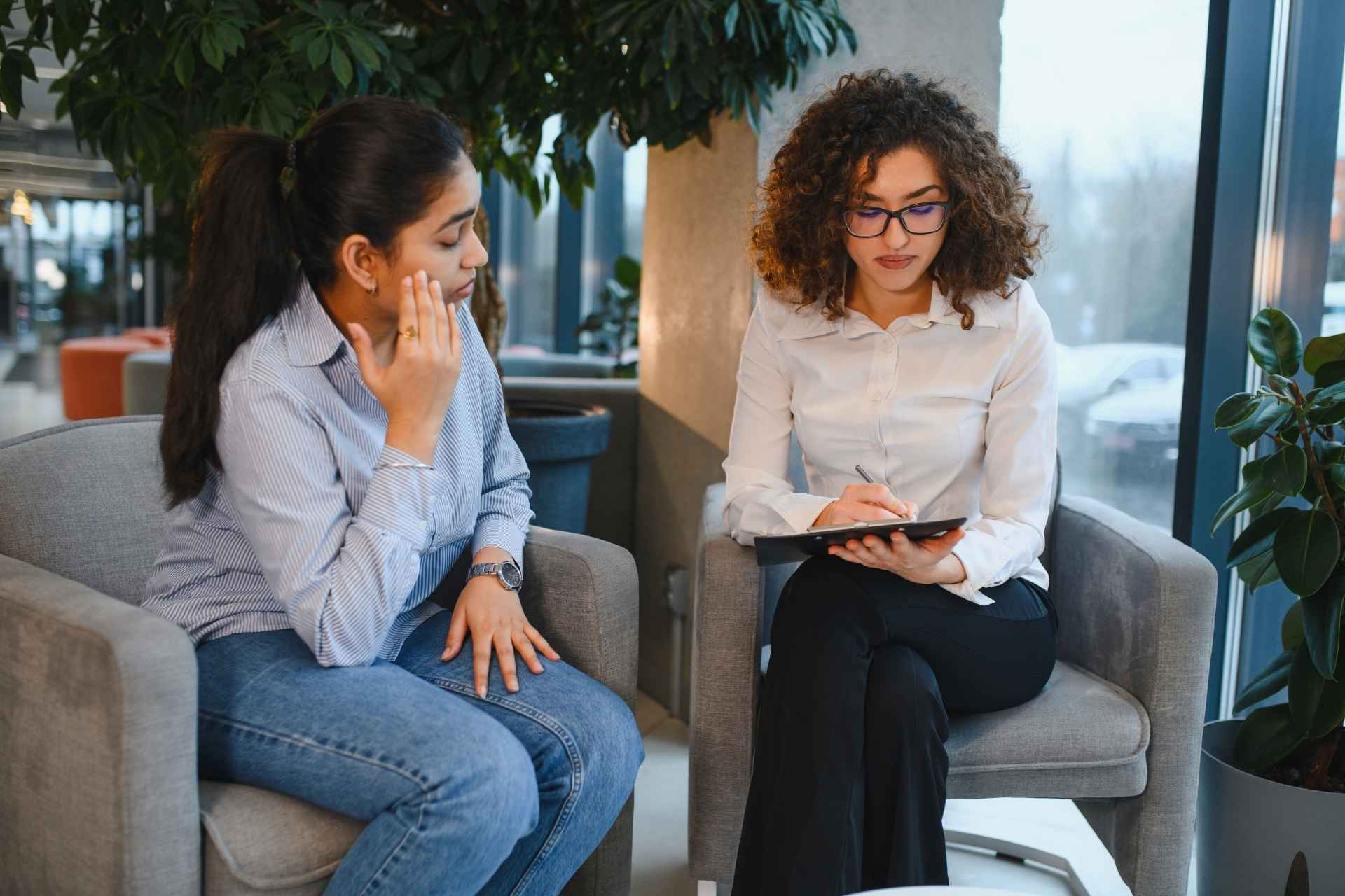 Woman meeting with a mental health professional to discuss treatment options